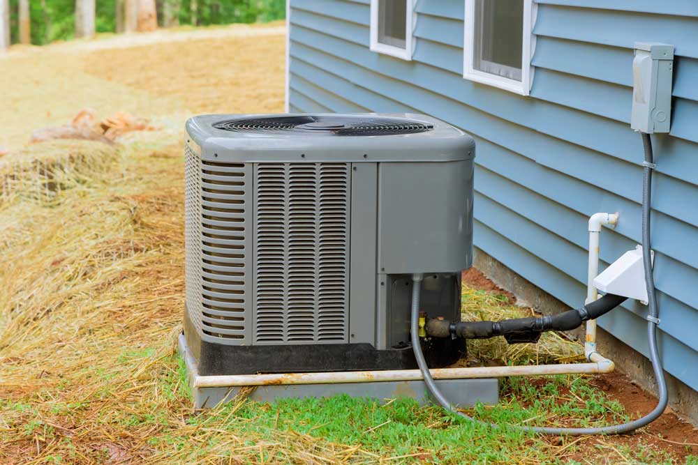 heat pump installed outside of new home