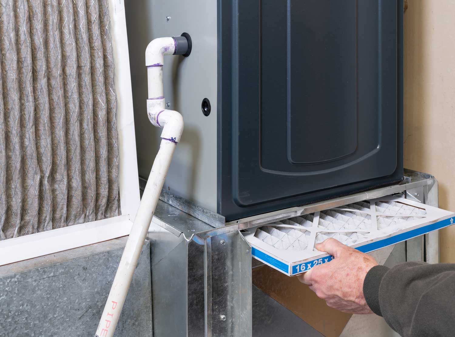 HVAC filter being replaced in home