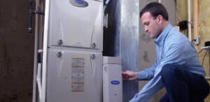 technician setting infinity air purifier in place